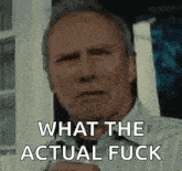 a man is making a funny face and saying what the actual fuck .