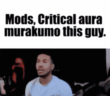 a man is sitting in front of a screen with the words mods critical aura murakumo this guy