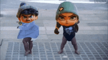 a couple of cartoon characters standing on a sidewalk .