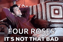 a man laying on a couch with the words four roses it 's not that bad on the bottom