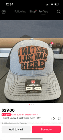 a hat that says " i don t know i just work here " on it