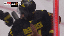 a hockey player with the name deb usk on the back