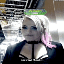 a woman with pink hair and a choker says oh wow thanks
