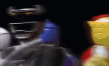 a blurred image of a robot and a man