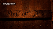 a sign on a wall that says elmit hic deo on it