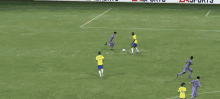 a soccer game is being played in front of a banner that says easports