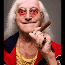 an elderly man wearing glasses and a red jacket is holding a cigar