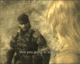 a man and a woman are standing next to each other with the words are you going to be ok