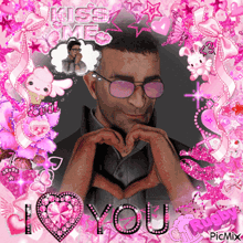 a picture of a man making a heart with his hands with the words i love you in the corner