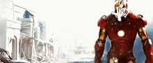 a man in an iron man suit is standing in front of a destroyed building .