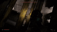 a video game is being played in a dark room with a lot of junk on the floor .