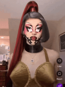 a woman with red hair and a ponytail has a like and react button on the bottom
