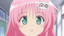 a girl with pink hair and green eyes has a sticker on her head that says o