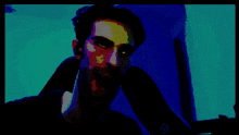 a pixelated image of a man talking on a phone