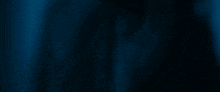 a close up of a person 's mouth with smoke coming out of it .
