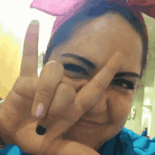 Hand Gesture Horns GIF - Hand Gesture Horns Smile GIFs