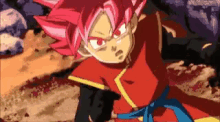 a pixel art of a person with red hair and a blue belt