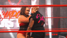 a female wrestler with the number 24 on her back