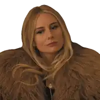 a woman is wearing a fur coat and a watch