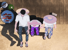 an aerial view of a family standing on a beach