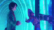 a man in a green jacket is standing next to a woman in a blue costume .