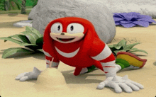 knuckles the echidna from sonic the hedgehog crawling on the ground