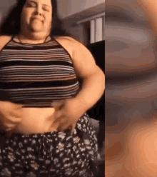 a woman in a striped crop top is holding her belly and smiling .