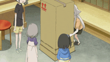 a cardboard box with a red sticker on it that says ' fragile '