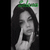 a woman 's face with the name selena written above it