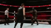 Kevin Owens Pop Up Powerbomb Mark Henry GIF - Kevin Owens Pop Up Powerbomb Mark Henry GIFs