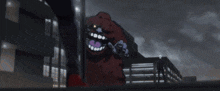 a person is holding a red circle in their hand .