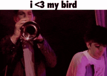 a man playing a trumpet with the words i < 3 my bird on the bottom
