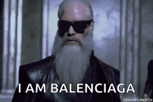 a man with a beard wearing sunglasses and a leather jacket says i am balenciaga