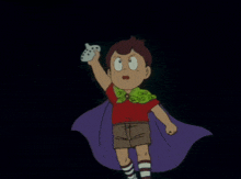 a boy in a cape is flying in front of a large white object