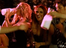 a group of women drinking from plastic bottles with the url rbd.gif below them