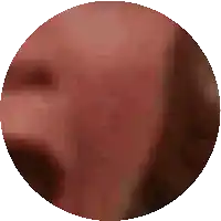 a close up of a person 's face with a circle around it