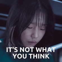 a woman with her eyes closed and the words it 's not what you think