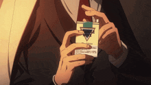 a man in a suit is holding a pack of change move