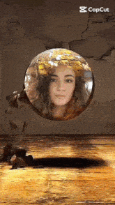a sphere with a woman 's face inside of it and the words capcut below it