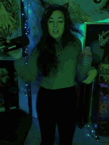 a woman is dancing in front of a sign that says whirlpool