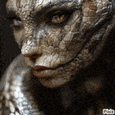 a close up of a person 's face with pixiz written on the bottom right