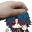 a person is petting a cartoon character 's head with their hand .