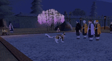 a group of people are standing around a cat and a tree with purple flowers