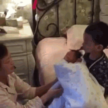 Sibling Rivalry GIF - Baby Cradling Flipping GIFs