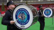 Playing Drums New York Police Department Marching Band GIF - Playing Drums New York Police Department Marching Band Macys Thanksgiving Day Parade GIFs