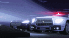 two cars are parked next to each other with one having a red light on top