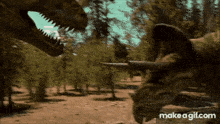 a gif of two dinosaurs fighting with the words make a gif.com in the bottom right corner