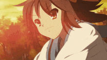 a close up of a girl with brown hair