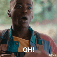 a man with a surprised look on his face says oh on the screen
