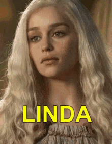 a close up of a woman 's face with the word linda on it